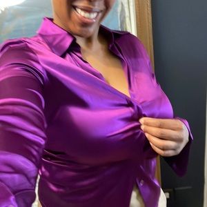 This is a Beautiful Silk & Spandex purple blouse